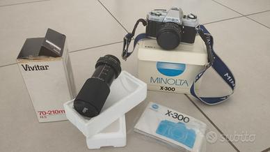 Minolta x300 + zoom Vivitar 70-210