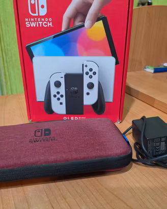 Nintendo Switch OLED + micro sd da 256GB + Custodi