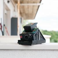 Polaroid SX70  con flash modificata itype