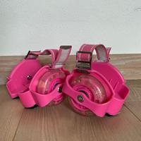 Flashing roller/ruote da pattinaggio rosa.