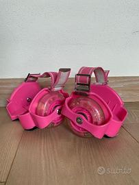 Flashing roller/ruote da pattinaggio rosa.
