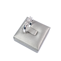 Anello trilogy in oro e diamanti