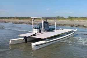 Catamarano a motore su scafi hobie 16