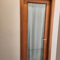Porte in legno e vetro