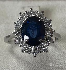 ANELLO ORO 18kt. CON DIAMANTI E ZAFFIRO BLU OVALE