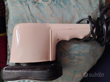 Massaggiatore elettrico portatile Vintage.