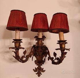 Coppia applique metallo dorato