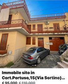 Stabile con due appartamenti più garage