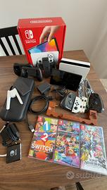 Nintendo Switch Oled + accessori e giochi