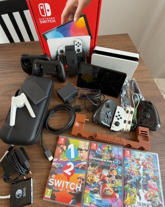 Nintendo Switch Oled + accessori e giochi
