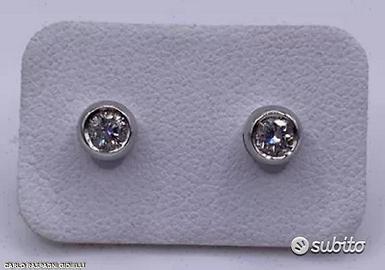 ORECCHINI PUNTOLUCE ORO 18kt. E DIAMANTI 0,27 G VS