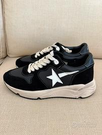 Golden goose running sole nere