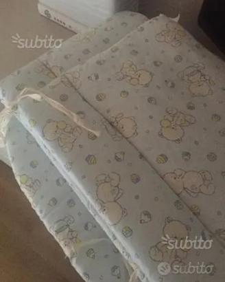 Paracolpi e coprimaterasso per lettino