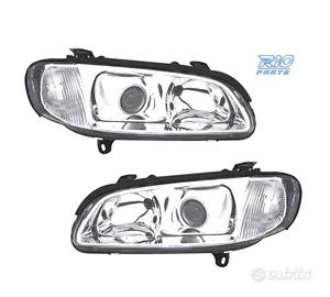 FARI PER OPEL OMEGA 94-99 LENTE CROMATA CON FONDO 