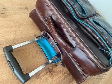 Valigia trolley in pelle Piquadro 43 x 40 x 20/28