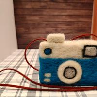 gioco macchina fotografica in lana cardata