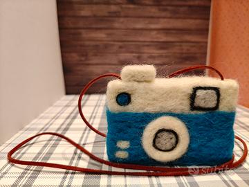 gioco macchina fotografica in lana cardata