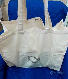 Gucci shop bag borsa sacco stoffa velluto gadget 