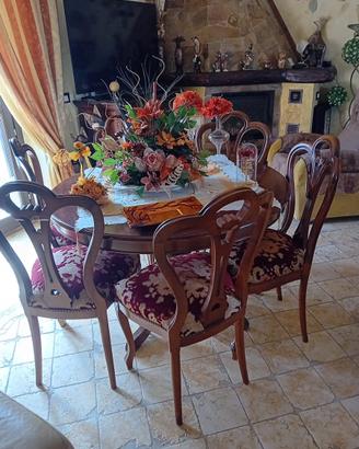 Tavolo e sedie in stile barocco