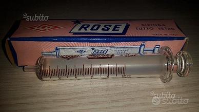 Coppia siringa in vetro e bollitore vintage