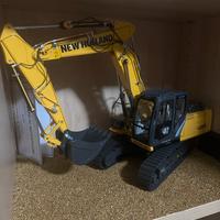 Modellino escavatore New Holland hachette