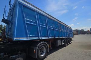 Semirimorchio ribaltabile posteriore per rottami