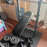 PANCA CON BILANCERE E MANUBRI