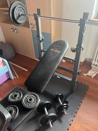 PANCA CON BILANCERE E MANUBRI