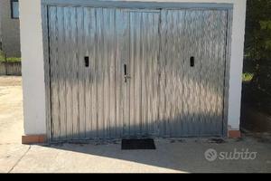 Portone basculante coinbientato