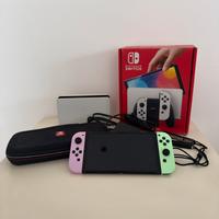 Nintendo Switch OLED + accessori + custodia