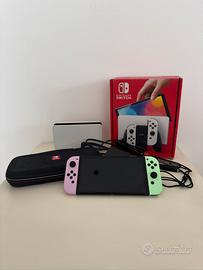 Nintendo Switch OLED + accessori + custodia