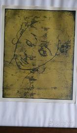 quadro volto stilizzato con cornice