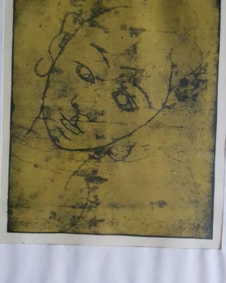 quadro volto stilizzato con cornice