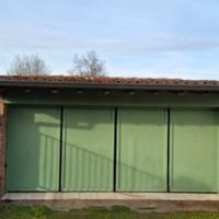 Portone a libro per garage