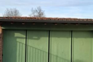 Portone a libro per garage