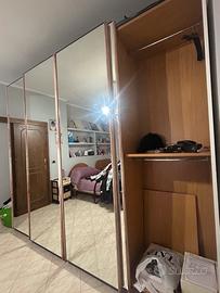 armadio a 4 ante scorrevoli letto e mobiletto