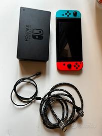 Nintendo Switch con Joy-Con Neon + Dock e cavi
