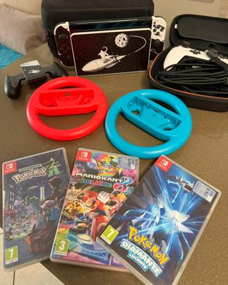 Nintendo Switch OLED + 3 Giochi + Accessori