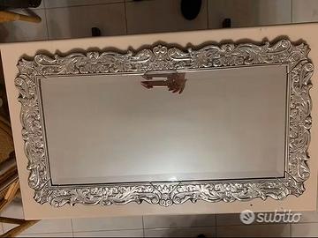 Specchiera a muro in argento lavorato (placcato)