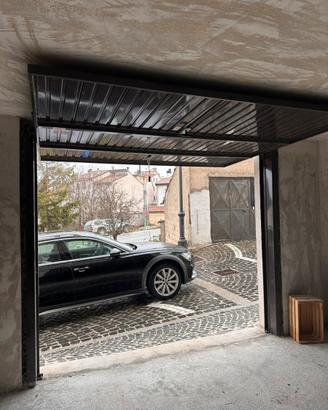 Porta basculante gatage