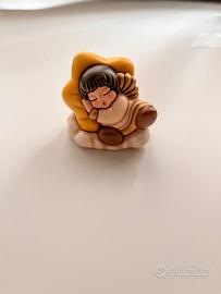 Statuina in ceramica Thun, Angelo su stella