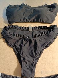 costume nero e pantaloncino