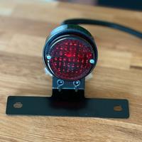 Fanale posteriore moto vintage con portatarga