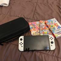 Nintendo switch oled bianca + giochi e custodia