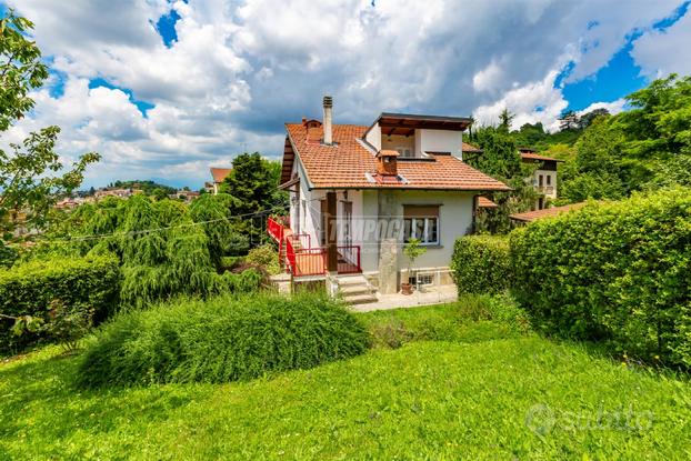 APPARTAMENTO CON VISTA PANORAMICA E GIARDINO PRIVA