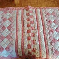 Copertina patchwork trapuntata realizzata a mano