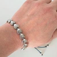 Coppia di bracciali con pesci