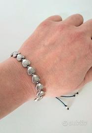 Coppia di bracciali con pesci