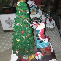 Babbo Natale che decora Albero Natale led