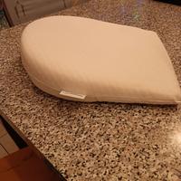 Cuscino anti reflusso per culla e carrozzina